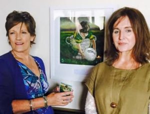 Two ladies with Kerry GAA image