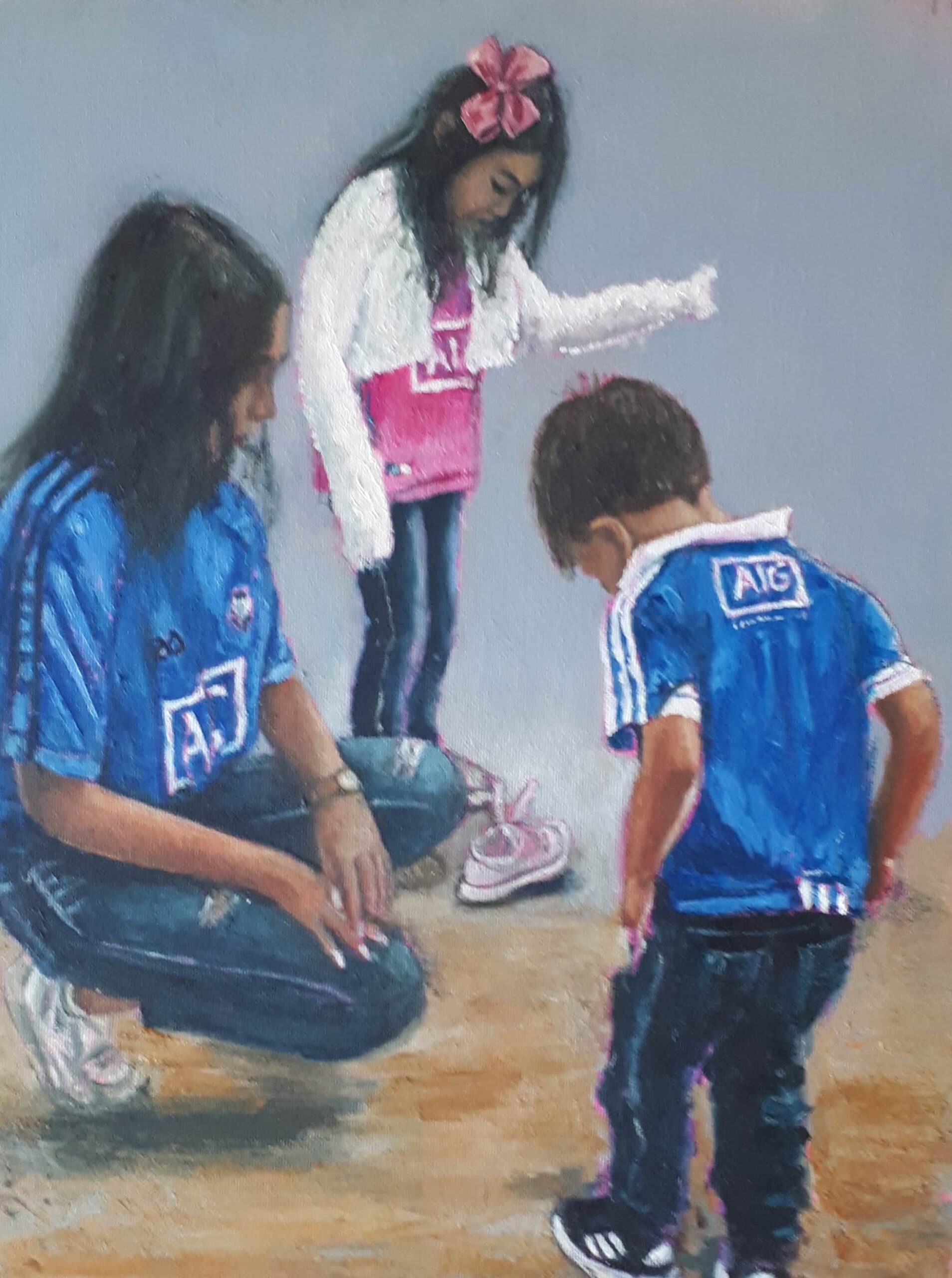 Three children on the beach in Dublin Jerseys