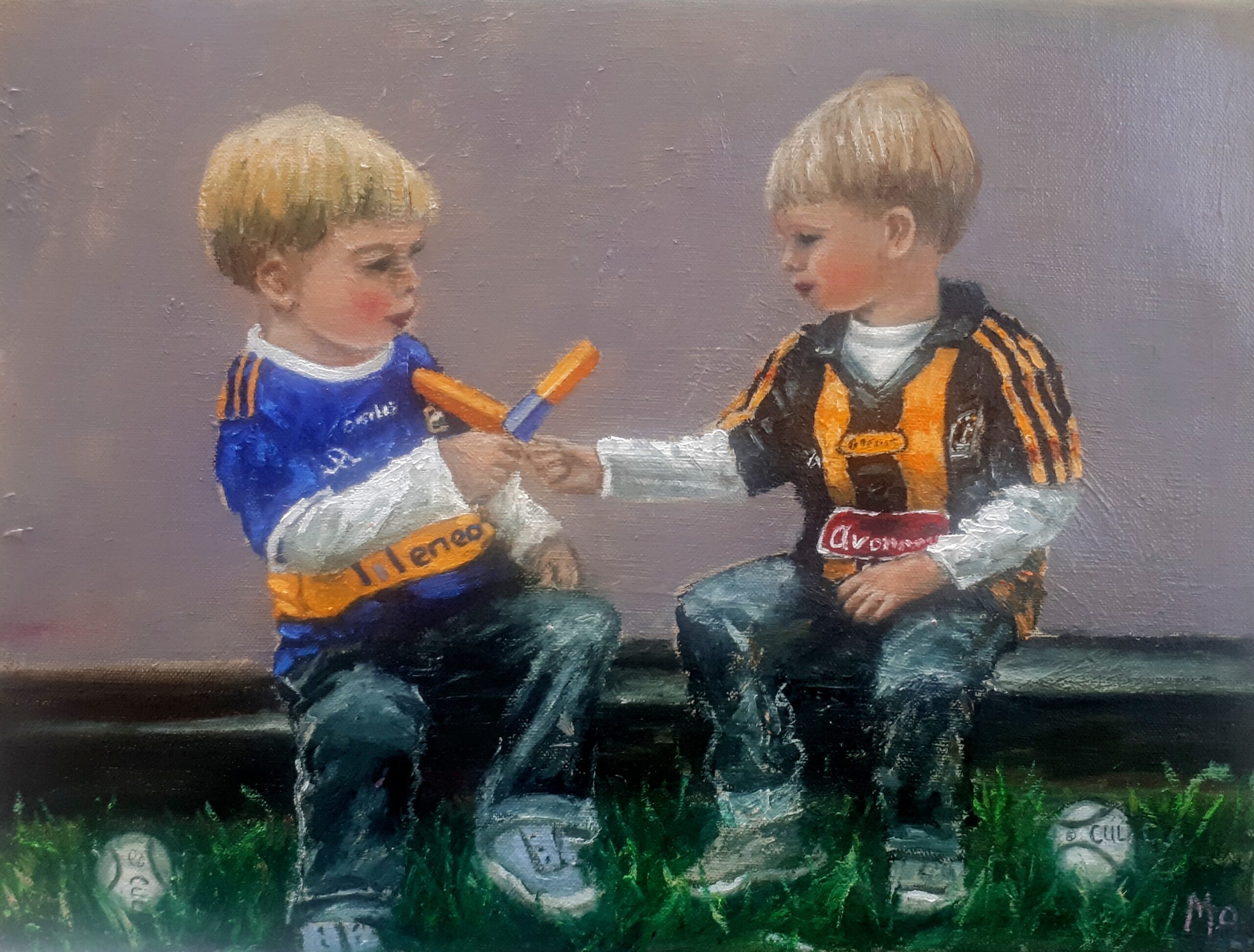 Two boys Tipperary and KILKENNY JERSEYS FIGHTING over ice cream