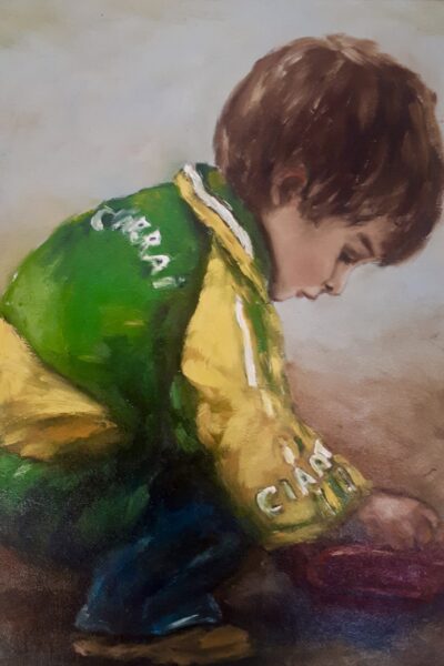 Little Boy Kerry jersey playing in the dirt