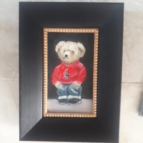 teddy bear dresses in jeans with paws in pockets