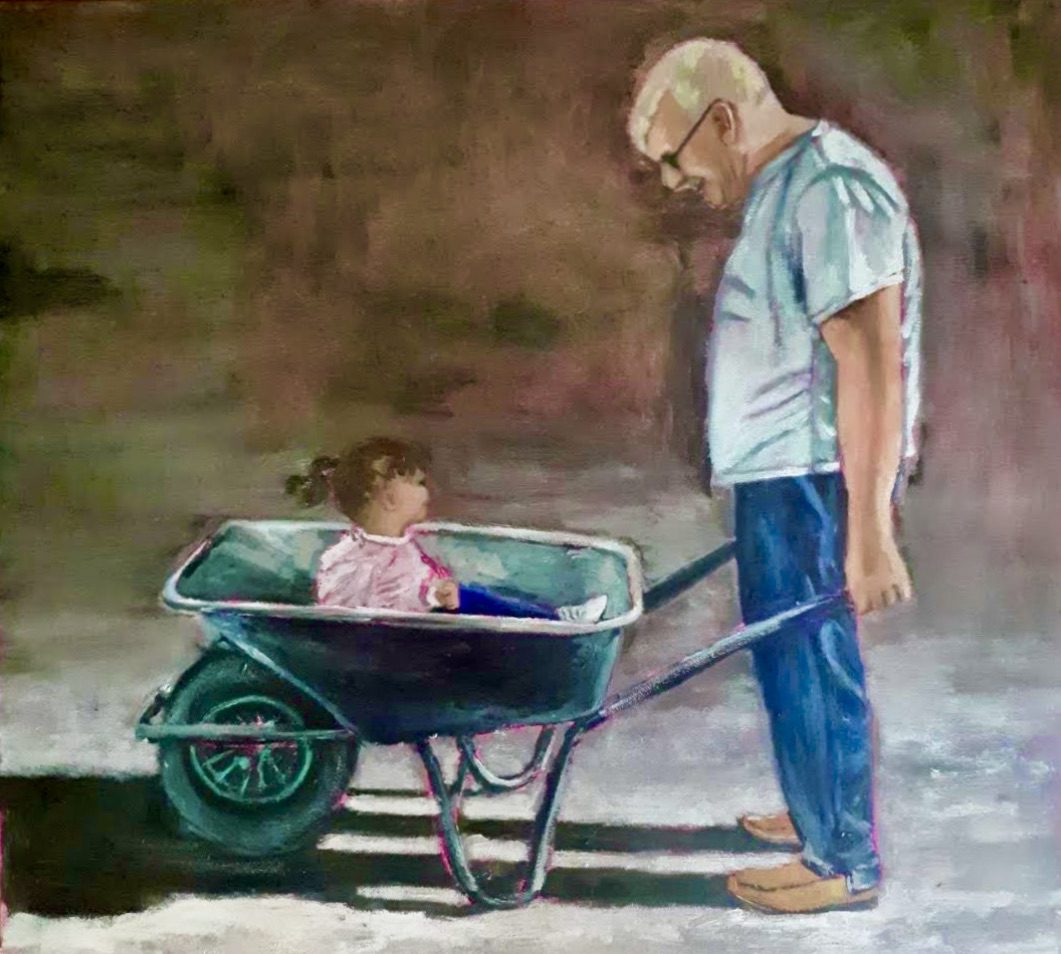 toddler in a wheelbarrow looking up at /Grandad rish art, irish gifts