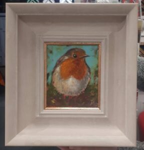 Little Robin Redbreast sitting on a branch